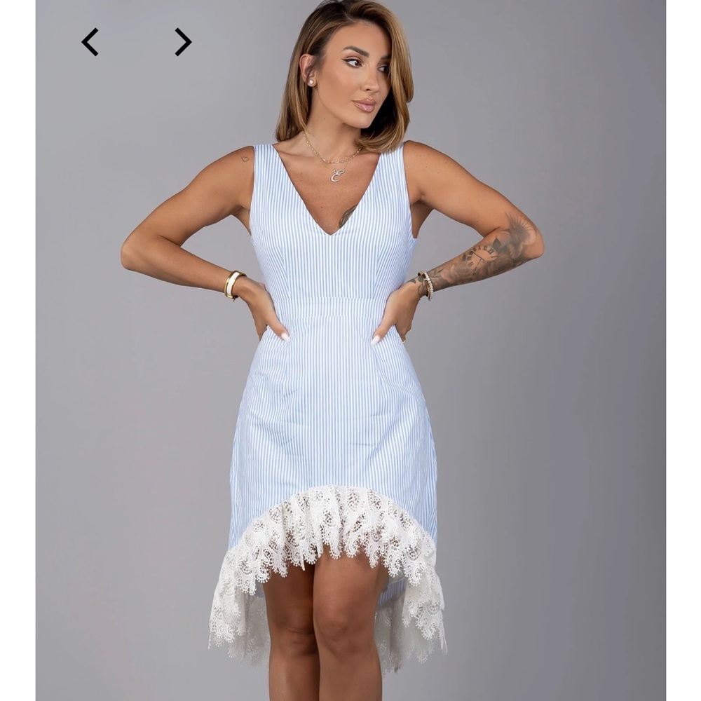 Liridona dress purchased but never worn.